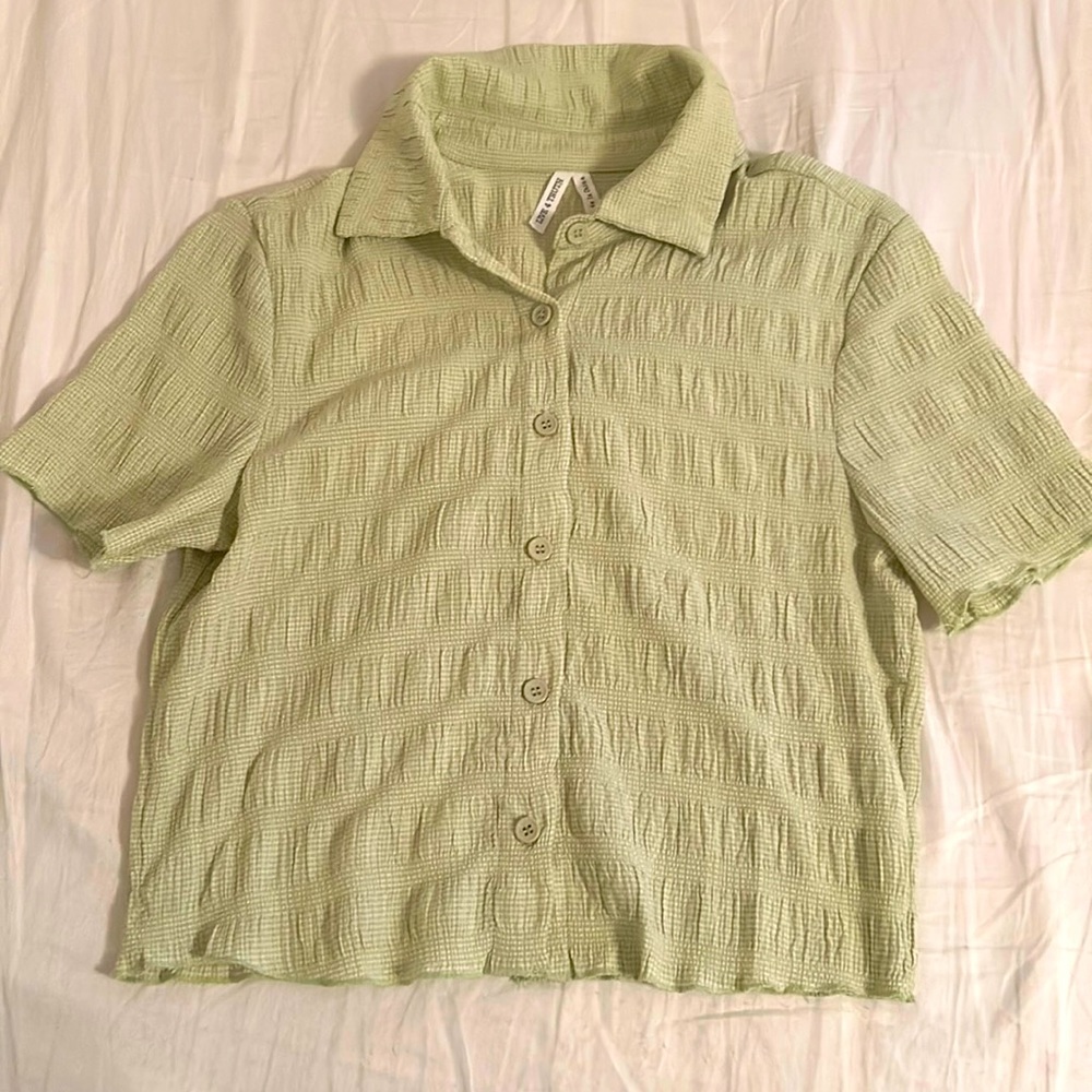 Brand is Live 4 Truth. it is a Green cropped tee button up.
